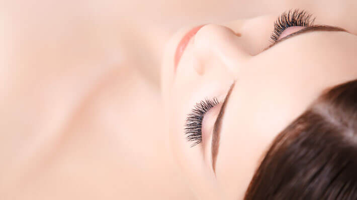 woman with beautiful eyelash extensions